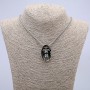 Pendant Skull 32x18mm on a chain, 65cm length, silver-tone metal