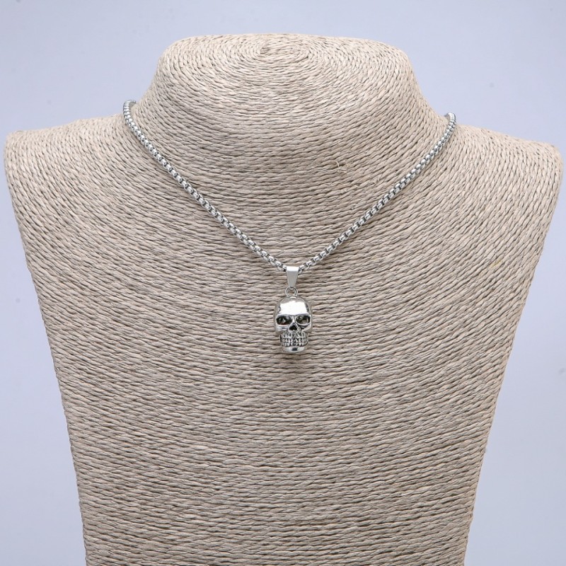 Skull Pendant 25x10mm on a chain, 65cm length, silver-coloured metal