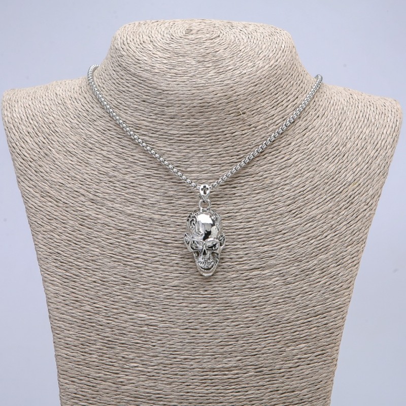 Pendant Skull 37x15mm on a chain, 65cm length, silver-tone metal