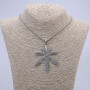 Pendant "Hemp Leaf" with White Rhinestone 72x53mm on a chain, length 65cm silver-coloured metal