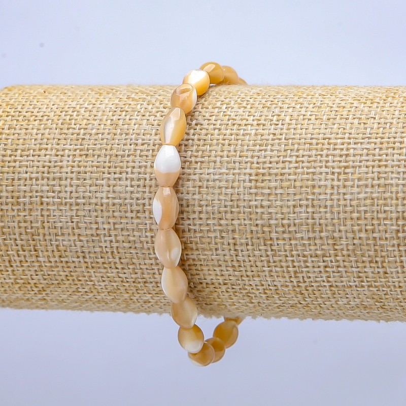 Natural Beige Mother-of-Pearl Bracelet on Elastic, oval beads, diameter 10x6.5mm+/-, length 18cm+