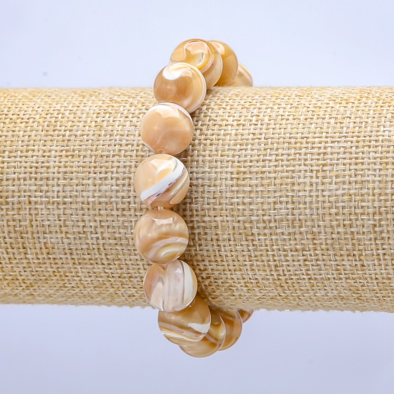 Elastic bracelet with natural Mother-of-Ppearl beige. smooth beads, diameter 10mm±, length 18cm±
