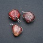 Pendant in a silver-plated setting made of Red Jasper, 32×22 mm diameter+