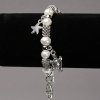 Elasticated River Pearl Bracelet with Silver-Tone Inserts and Pendants, diameter 8-10mm+-, length 18cm+