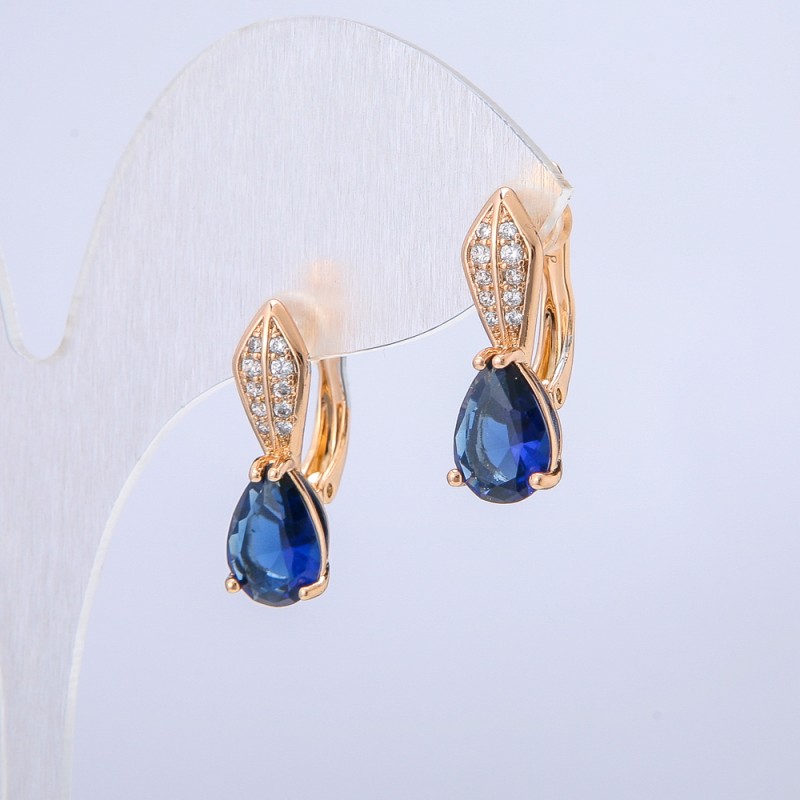 Xuping Earrings 18K Gold Plated with White Rhinestones and a Dark Blue Crystal, diameter 20x6mm +