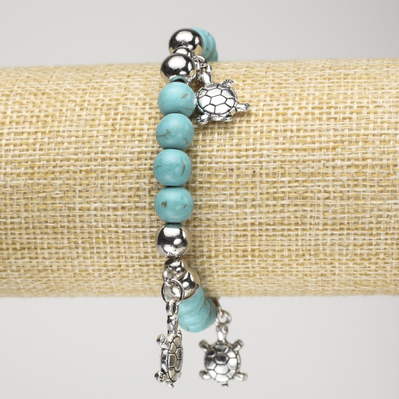 Turquoise Bracelet (Imitation) on Elastic, Diameter 8mm+/- with Silver-Tone Inserts and Turtles, Length 18cm+