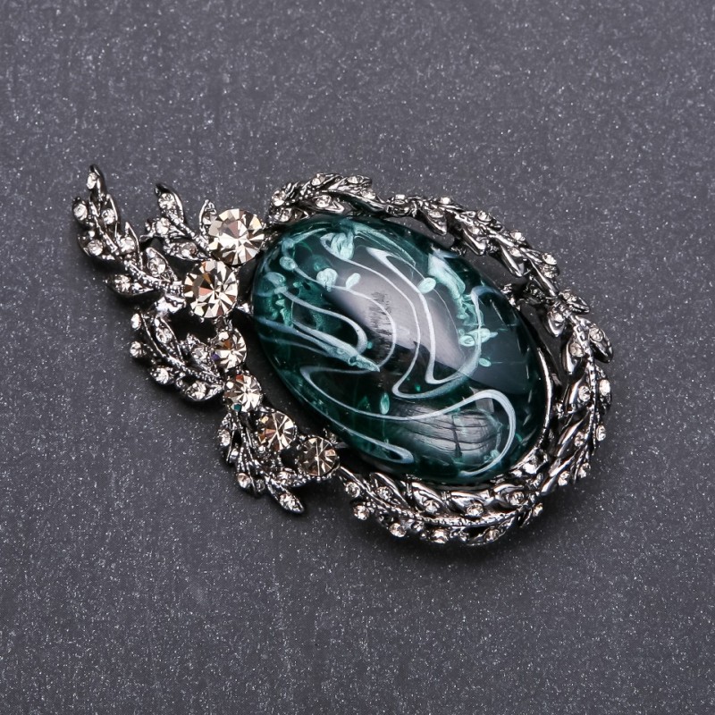 Clearance! Brooch with grey rhinestones and emerald cabochon 64x38mm grey metal