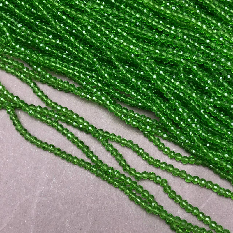 Czech Crystal Beads on fishing line, transparent light green, faceted rondelle, diameter 3x2.5mm +/-, length 36cm +