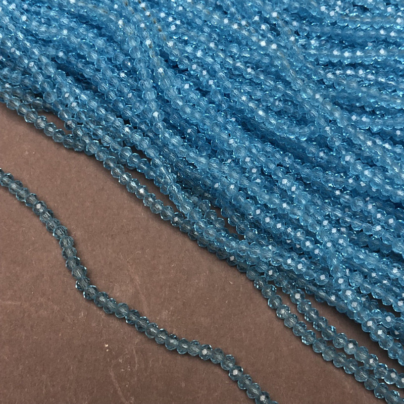 Czech Crystal Beads on fishing line, transparent sky-blue, faceted rondelle, diameter 3x2.5mm +/-, length 36cm +