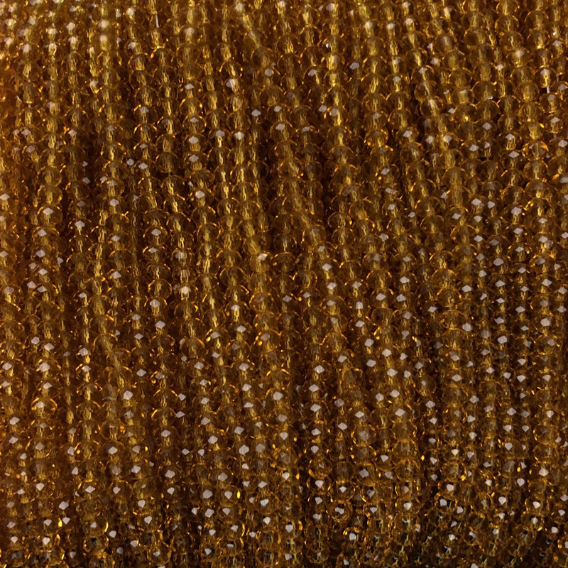 Czech Crystal Beads on fishing line, transparent dark yellow honey, faceted rondelle, diameter 3x2.5mm +/-, length 36cm +