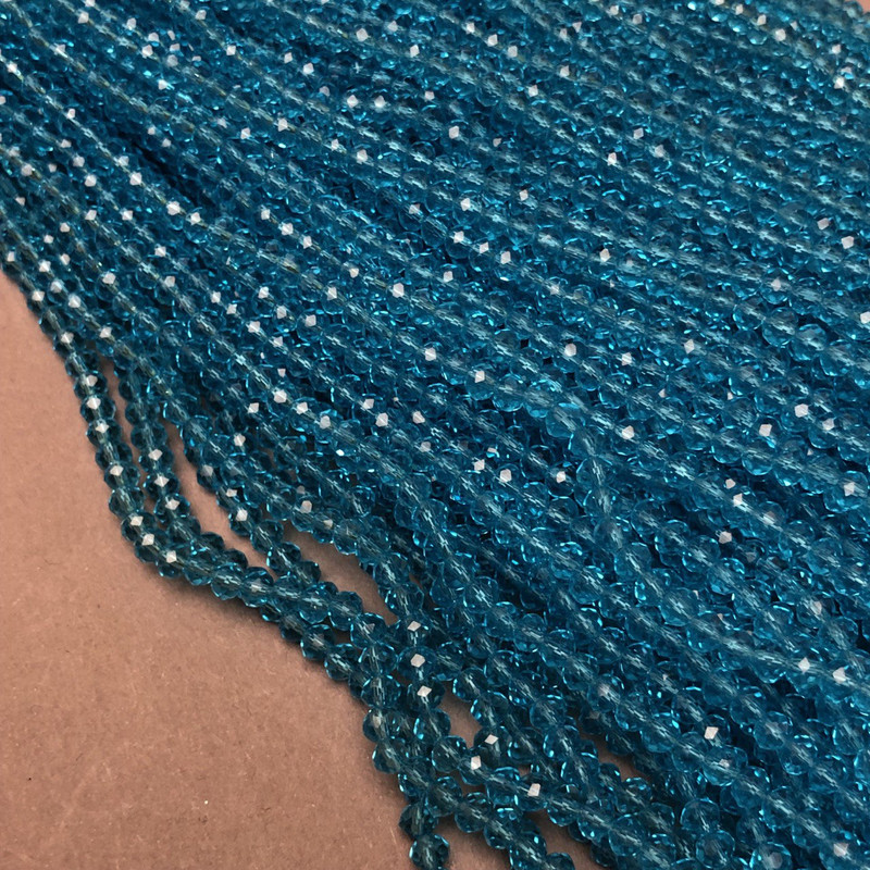 Czech Crystal Beads on fishing line blue-green faceted rondelle, diameter 3.5x3mm +/-, length 36-38cm+