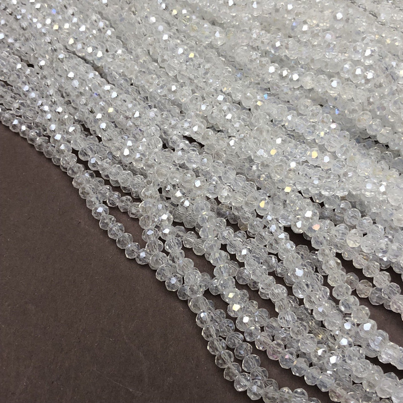 Czech Crystal Beads on fishing line white transparent with petrol sheen faceted rondelle, diameter 3.5x3mm +/-, length 36-38cm+