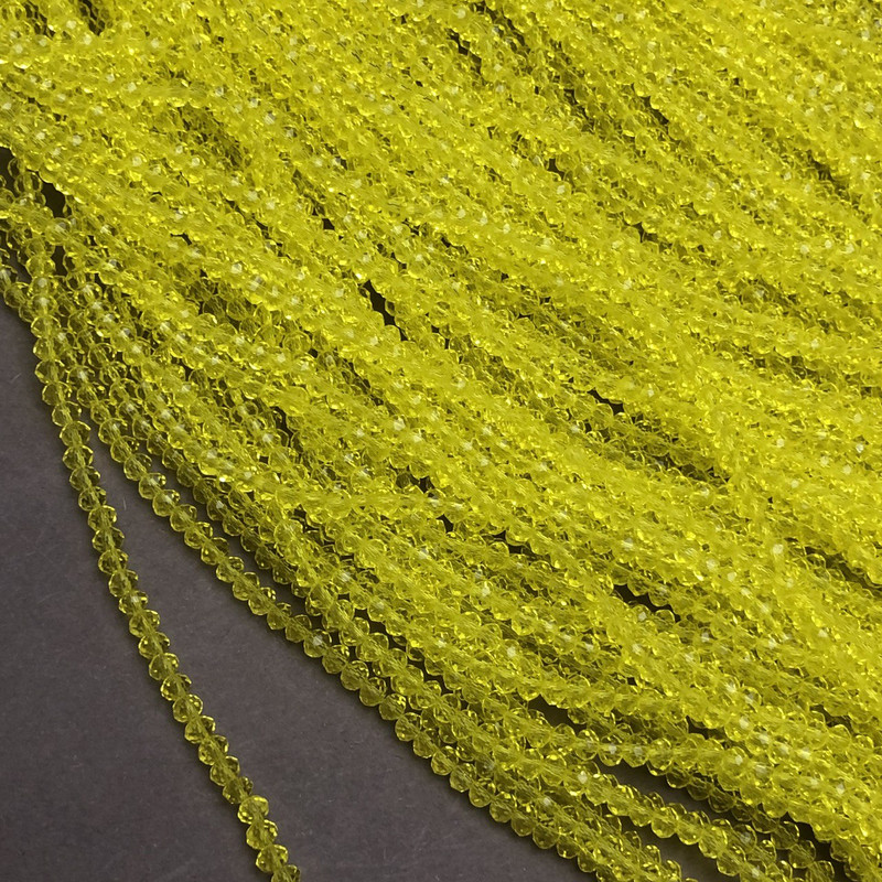 Czech Crystal Beads on fishing line yellow transparent faceted rondelle, diameter 3.5x3mm +/-, length 36-38cm+