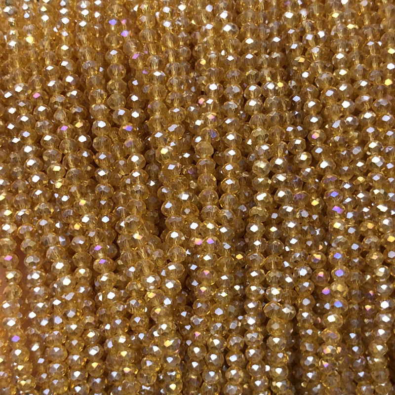 Czech Crystal Beads on fishing line, orange-peach transparent with petrol-tone shimmer, faceted rondelle, diameter 3.5x3mm +/-, length 36-38cm
