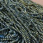 Czech Crystal Beads on fishing line, grey-green coating with petrol-tone shimmer, faceted rondelle, diameter 3.5x3mm +/-, length 36-38cm +