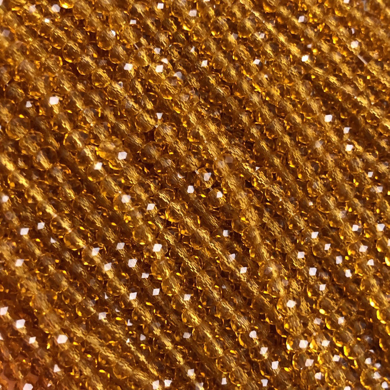 Czech Crystal Beads on fishing line dark yellow honey transparent faceted rondelle, diameter 3.5x3mm +/-, length 36-38cm+