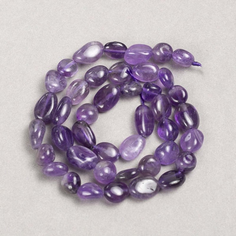 Amethyst Beads on Thread, natural stone, faceted, diameter 9x11mm, ± length 40cm ±