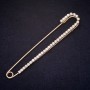 Brooch pin 100x17mm with crystals, white stones on gold-toned metal