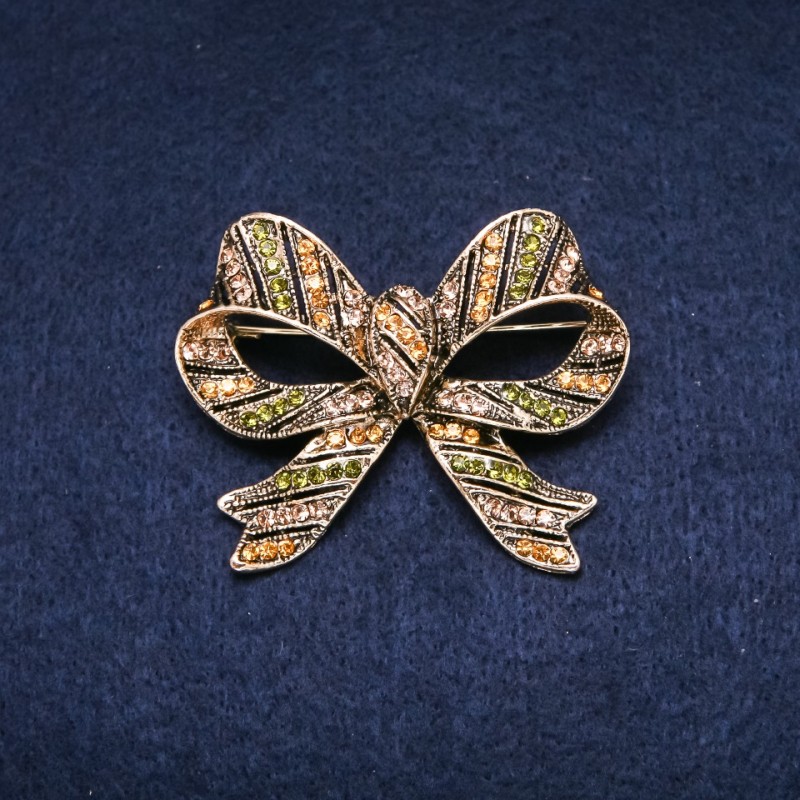 Accent Bow Brooch 55x45mm, Green and Yellow Rhinestones, Gold-Tone Metal