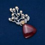 Brooch with Carnelian 74x32mm with a bead, silver metal with gold-tone plating