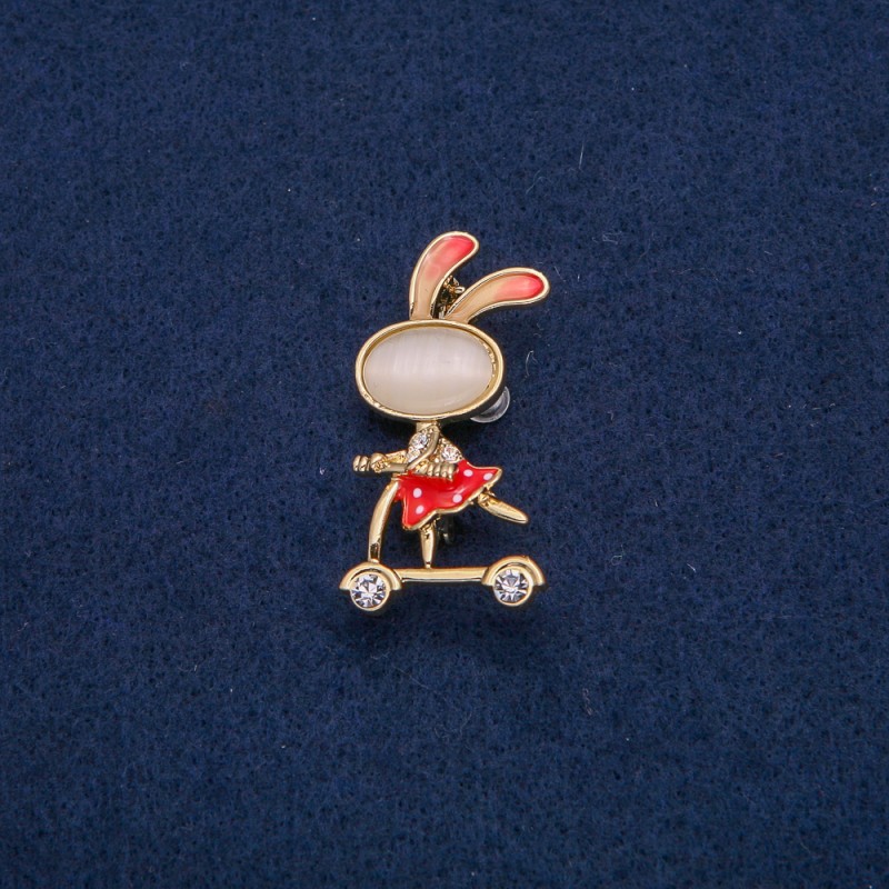 Bunny on a Scooter Brooch with White Rhinestones, Gold-Tone Metal, Red Enamel, Beige Cat's Eye Cabochon, 43x21mm +