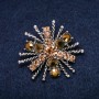Brooch Order of Beauty 45x40mm rhinestones colour yellow silver metal