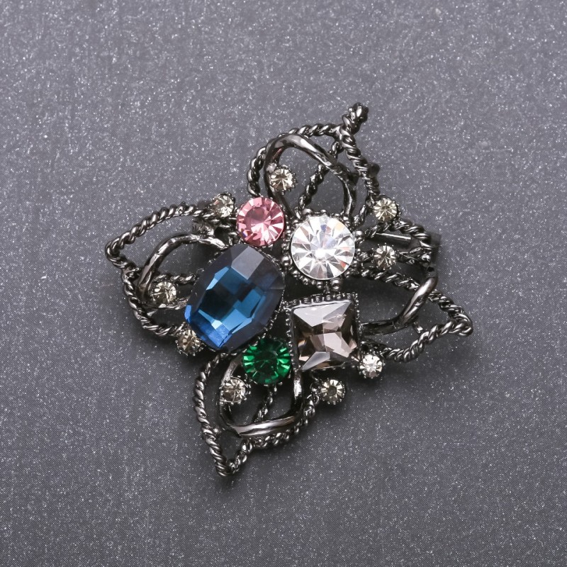 Order of Beauty Brooch with Blue Crystal 51x48mm, Black Metal