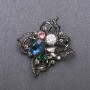 Order of Beauty Brooch with Blue Crystal 51x48mm, Black Metal