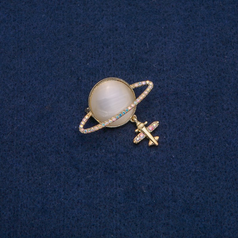 Saturn Cat's Eye Brooch (Beige) with Plane, Gold-tone Metal with Petrol Rhinestones, 35x20mm +