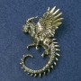 Brooch Dragon with golden metal and blue rhinestones 64x50mm+