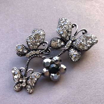 Bright Brooch Metal in Droplet Silver-Tone Butterflies Sitting on a Flower Garland, Dark and White Rhinestones 55x34mm +