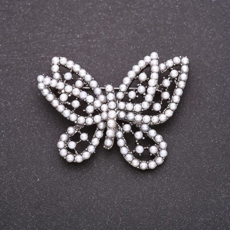 Brooch Butterfly with white beads 49x39mm grey metal