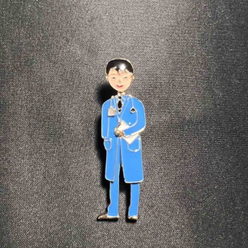 Brooch 'Medical Brother' with blue enamel, golden metal 17x62mm