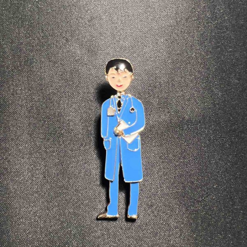 Brooch 'Medical Brother' with blue enamel, golden metal 17x62mm