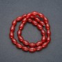 Carved barrel beads of Carnelian on thread, diameter 8×12mm, length 38cm