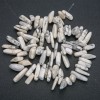 Kaholong chip bead on a thread “needle” shape, diameter 20×8mm, length 40cm +