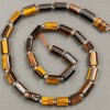 Beads on thread - Tiger's Eye, faceted 11x7mm, length 40cm+