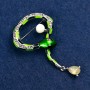 Brooch "Snake" green enamel with crystal, bead and white rhinestones, metal in silvery colour 35x64mm