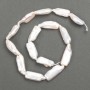 Baroque pearls with petrol tint on a thread d 26-32x10-11mm +-, thread length approximately 39 cm+