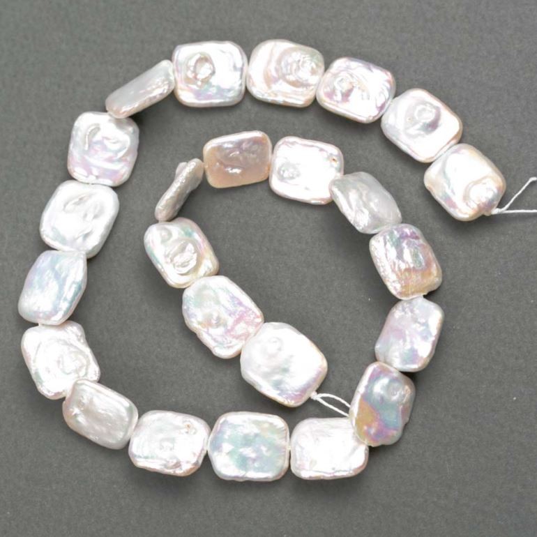 Baroque pearls with petrol tint on thread d 15-17×13-16mm +-, length 38cm+