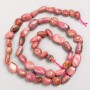 Beads on Thread, Natural Stone Rhodochrosite Tumbled d 7x9-6x7mm+-, length 40cm+