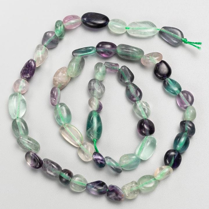 Beads on a thread of natural stone Fluorite tumbled d 7×11-6×8mm+-, length 40cm+