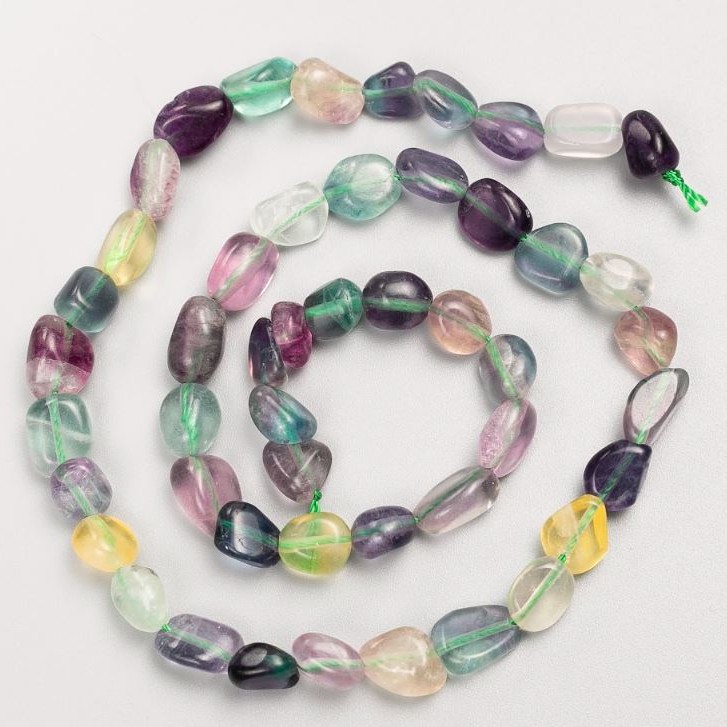 Beads on a thread of natural stone Fluorite tumbled d 8×9mm+-, thread length 40cm+