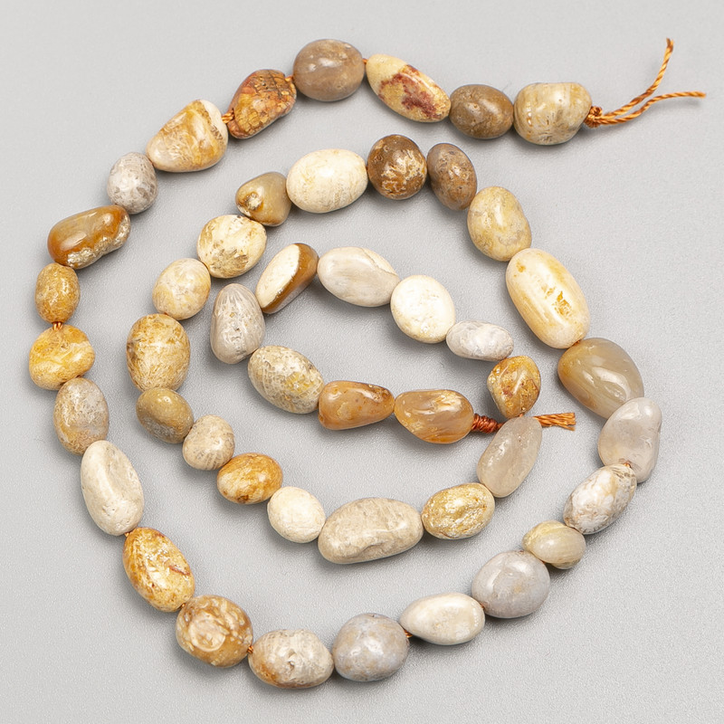 Fossilised Coral Stone Beads, Tumbled, on a Strand, Diameter 7x9mm+-, Length 40cm+