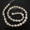 River Pearl Strand, Diameter 9x8mm, Length 40cm+- with Petrol Sheen