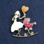 Mother with Cradle Brooch, white and raspberry enamel, gold-tone metal 46x38mm
