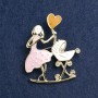 Mother with Cradle Brooch, pink and white enamel, gold-tone metal 46x38mm