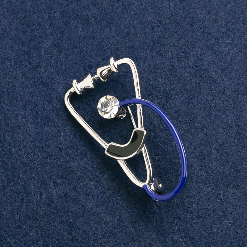 Stethoscope Brooch, black and blue enamel, with white stone, silver-tone metal, 43x24mm