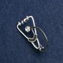Stethoscope Brooch, black enamel, with white stone, silver-tone metal 43x24mm