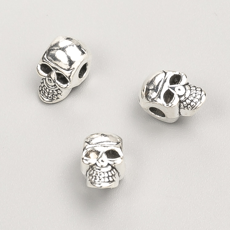 Bead insert findings Skull, diameter 11x7x7mm, pack 20g, 14pcs+/- metal colour "silver"
